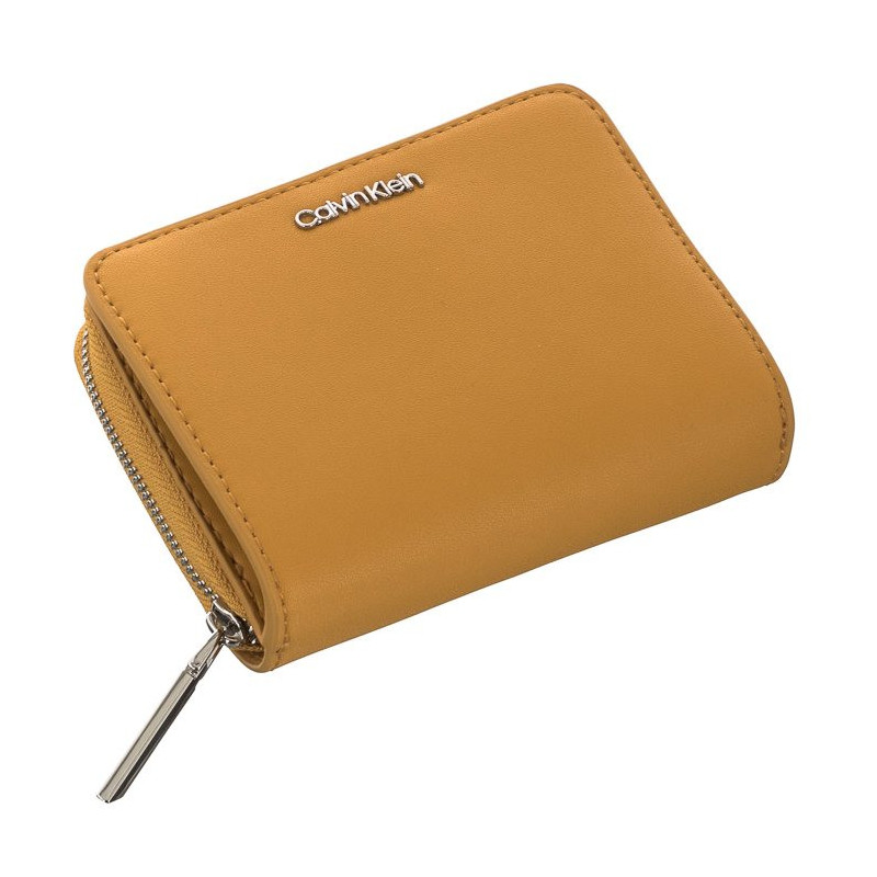 Calvin Klein CK Must Z/A Wallet W/Flap MD Monarch Gold K60K607432 KB7 (CK156-b) käekott