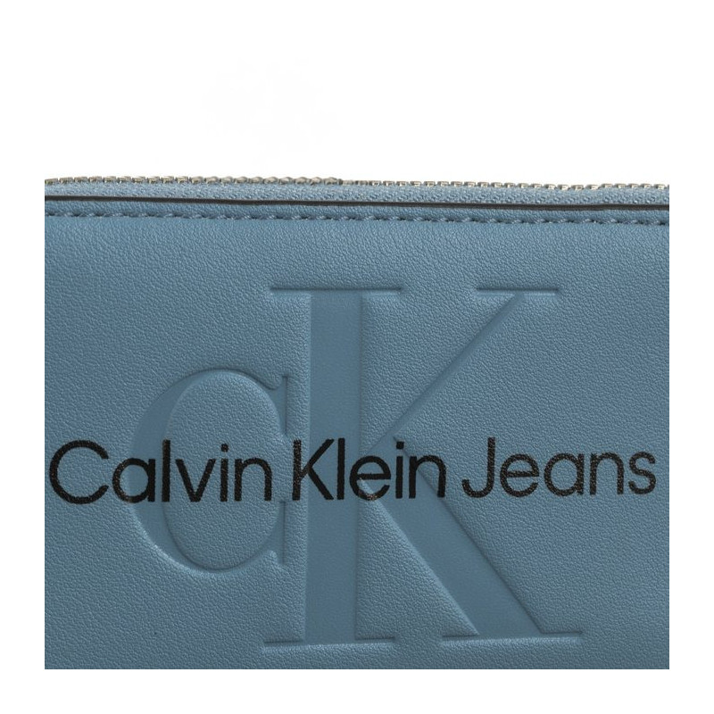 Calvin Klein Sculpted Med Zip Around Mono Blue Shadow Logo K60K607229 CEZ (CK121-e) käekott